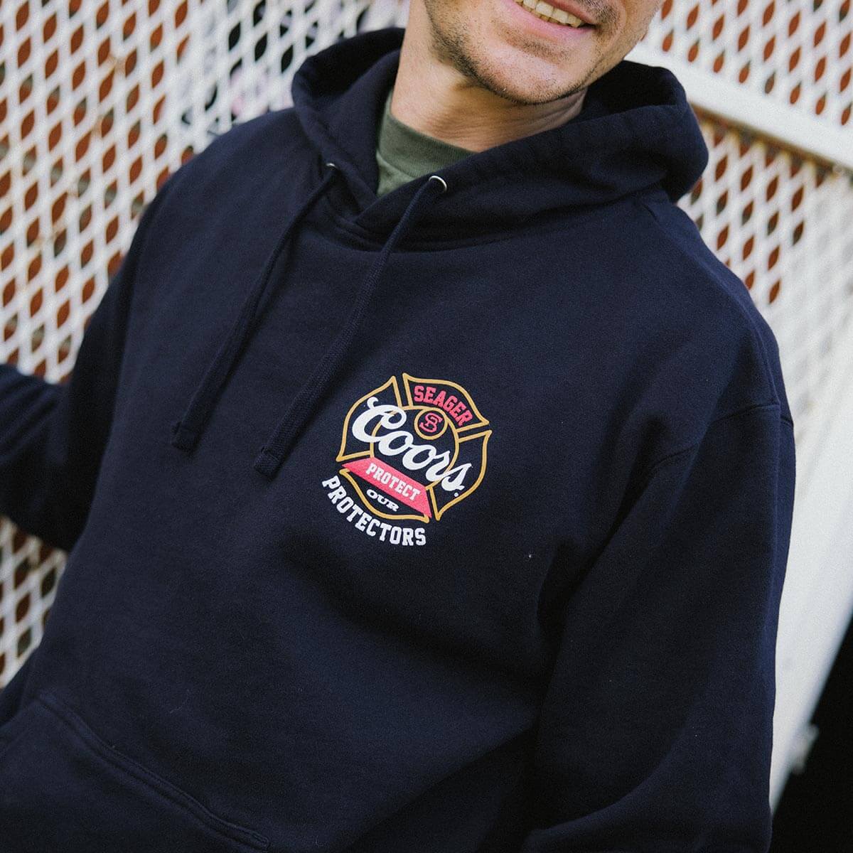 Seager x Coors Banquet Protectors Badge Hoodie Navy