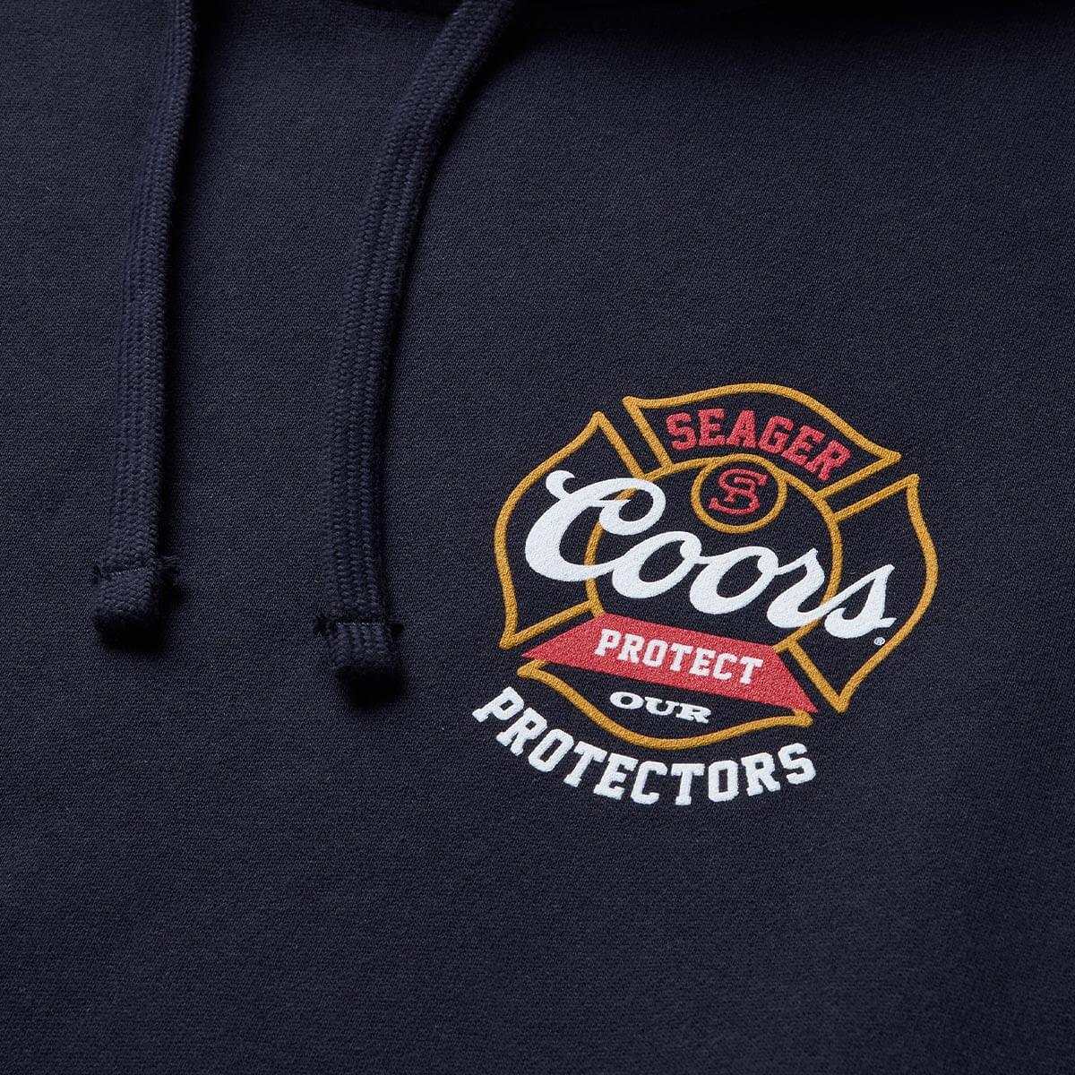 Seager x Coors Banquet Protectors Badge Hoodie Navy