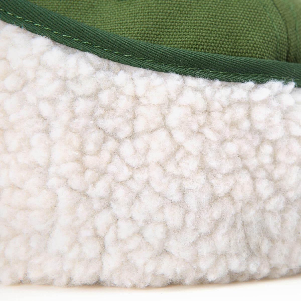 Close-up of a product with green edge and white textured surface